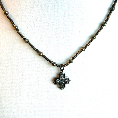 Tiny Sterling Cross on Pyrite & Dark Heishi Beads