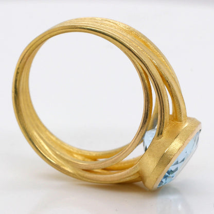 Large Oval Blue Topaz Ribbon Ring