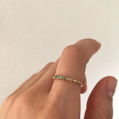 JKD R - 3 Green Sapphire Equilibrium Ring; 14kt YG; 7