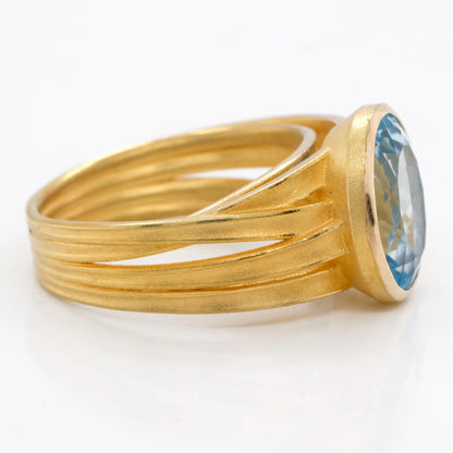 Large Oval Blue Topaz Ribbon Ring