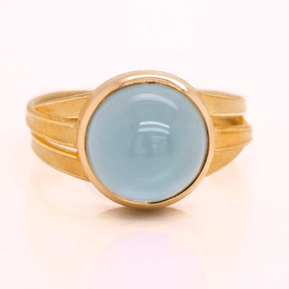 Flat Ribbons Ring with Aquamarine Cabochon in 18kt Gold